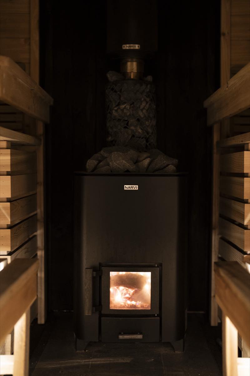 RO Sauna detail — ladle, bucket, and sauna stones